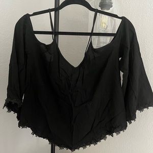 Black Off-the-Shoulder Blouse with Daisy Hem